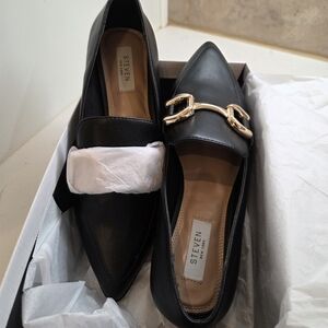 Steven Black Leather Loafers with Gold Detail